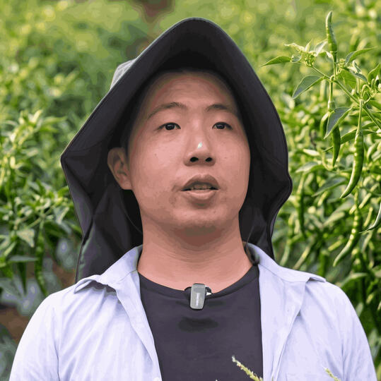 Testimonial profile photo of Mr. Scott Teh, a commercial chilli grower from Elsion Bioseeds, who uses QarboGrow nanotechnology to maintain consistent crop yields and boost plant resilience in unpredictable climates.